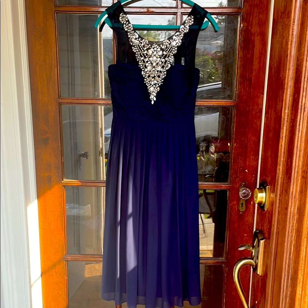 Beautiful chiffon all lined navy blue mid with very generous embellishments!